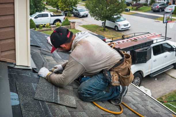 Professional Gutter Repair And Installation technician working in Maywood, NJ